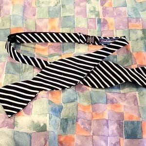 Adjustable bow tie. Black and white stripe